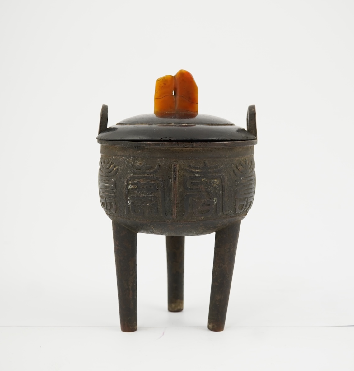 A Chinese bronze tripod censer and cover, ding, late Ming Dynasty